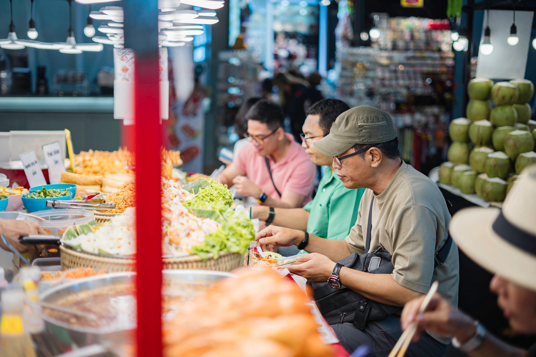 Customer buying barbecue street food from a vendor