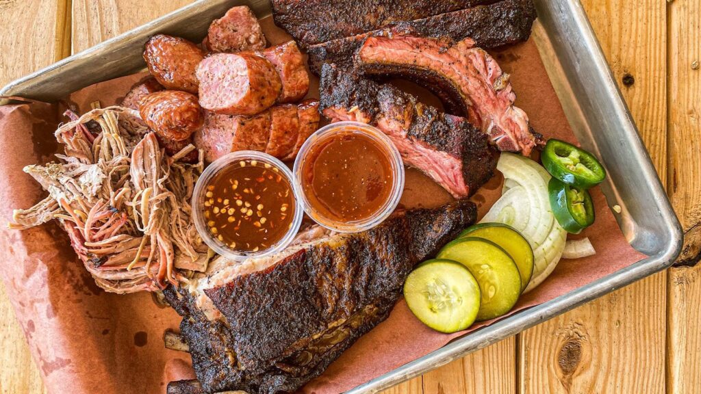 Barbecue platter with meats and sauces